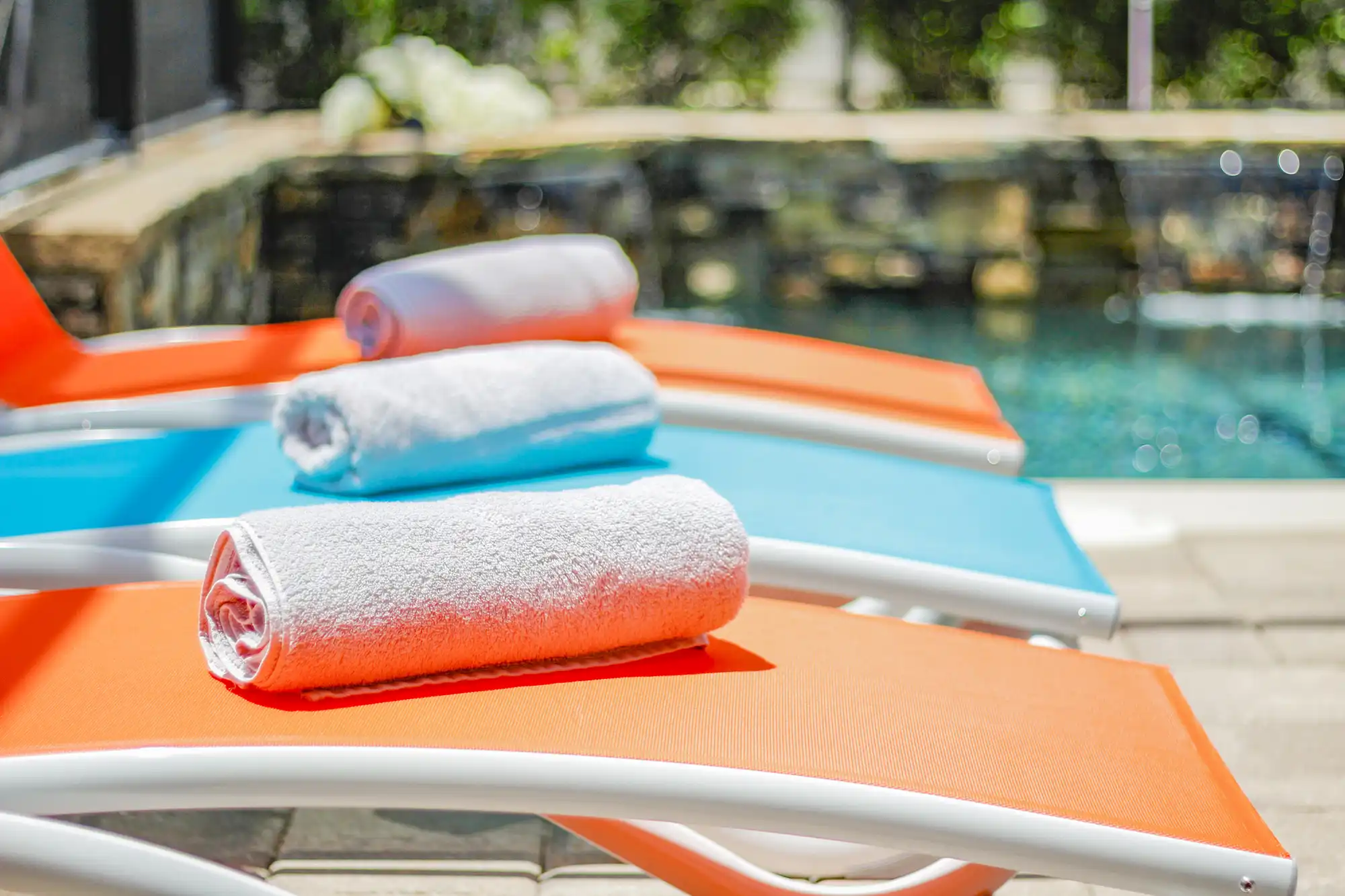 Pool Chairs with Towels - Vacation Rental Photography - Kissimmee, FL